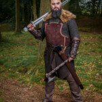 Viking with sword and axe.